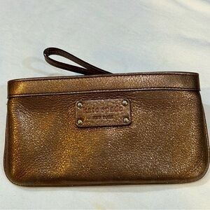 Kate Spade bronze metallic wristlet